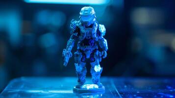 A detailed shot of a small figurine coated in photoluminescent pigment highlighting the precise and even application of the pigment on the toys surface photo