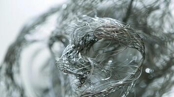 The intricate details of a magnetic wire sculpture are highlighted in a closeup shot showcasing the skill and precision required to create such delicate yet powerful artworks photo