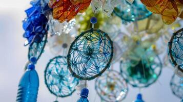 An upclose look at a dreamcatcher made from up plastic bottles showing the intricate and delicate nature of the art form photo