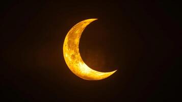 The sun partially hidden behind the moons shadow during a solar eclipse reminding us of the moons powerful influence on Earth photo