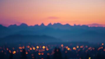 The peaks of the mountains seem to glow as if lit from within by the rosy alpenglow photo