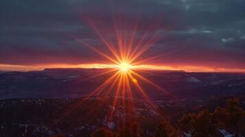 As the sun sets majestic columns of light rise up towards the sky giving the appearance of sun pillars photo