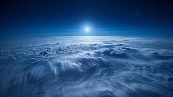 Pristine noctilucent clouds illuminated by the soft light of the moon creating an ethereal atmosphere photo