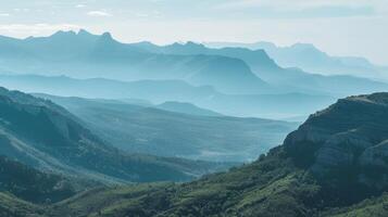 A vista of a vast mountain range and its shadow stretching out before an endless horizon photo