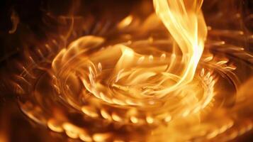 The flame of a gas stove swirls and curls dancing to its own silent melody photo
