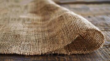 A table runner made from teastained burlap adding a rustic and environmentally friendly touch photo