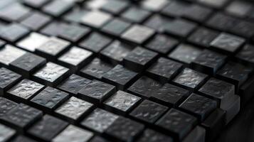 An intricate abstract pattern adorns this textured smartphone back resembling a mosaic of tiny squares in shades of silver grey and black photo