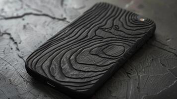 Fine grooves like tree bark give a tactile feel to this textured smartphone back resembling ridges from a topographical map photo