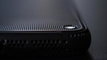 The texture of the casing is smooth but with a subtle raised grid pattern adding a touch of sophistication to the gadgets design photo