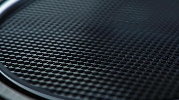 The bezels surface is adorned with a fine mesh pattern adding depth and dimension to the otherwise sleek design photo
