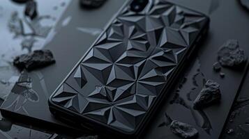 The embossed pattern on the casing is a series of geometric shapes creating a symmetrical and precise look on the gadget photo