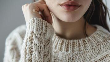 Intricate and subtle variations in the wool fibers create a unique texture that is both gentle and visually appealing making this sweater a timeless addition to any wardrobe photo
