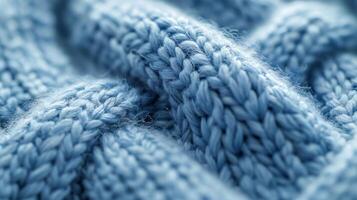 The subtle crisscross pattern formed by the delicate fibers giving the sweater a unique and sophisticated look photo