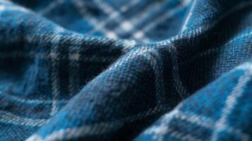 Cotton Blend In this closeup texture image the softness and flexibility of the flannel shirts cotton blend fabric is evident making it a comfortable and versatile garment photo