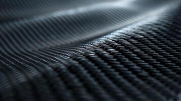 A matte carbon fiber pattern appears almost threedimensional with a geometric design of alternating diagonal lines. The texture is rugged yet sleek emitting a modern and hightech feel photo