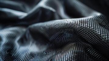 Running your fingers over the fabric reveals a surprisingly soft and supple texture with the carbon tubes adding a subtle firmness to the overall feel photo