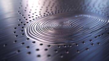 A macro image of a fingerprint sensor embedded into a sleek metallic surface showcasing its integration and blending with modern technology photo