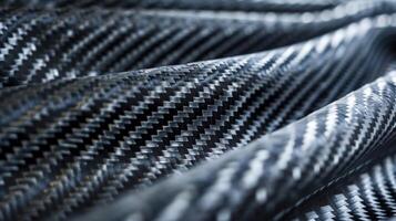 A detailed shot of carbon fiber strands tightly twisted together creating a strong and lightweight texture photo