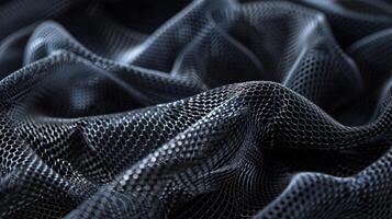 The intricate weaving of carbon nanotubes gives the fabric a dynamic texture almost like a threedimensional grid adding a sense of depth and dimension to the surface photo