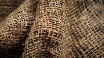 Small bumps and knots can be felt throughout the texture adding to the ruggedness of the burlap sack photo