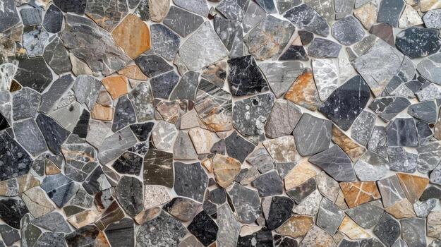 A mosaiclike effect on a granite countertop with small irregularly shaped pieces of different shades of grey creating a dynamic and tactile texture photo