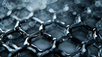 With a semimetallic luster this closeup texture reveals the intricate network of nanomaterials forming a thin durable coating. The surface appears to have a futuristic hightech quality photo