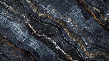 A closeup of the intricate s and crevices of a dark grey granite countertop giving it a unique and organic appearance photo