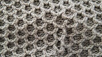An intricate honeycomb pattern adds visual interest to this richly textured cotton jersey knit ideal for lightweight sweaters or cardigans photo