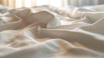 The surface of the cotton sheets is smooth and flat but upon closer inspection one can see the intricate details of the woven fabric. The sensation is that of a gentle caress as i photo