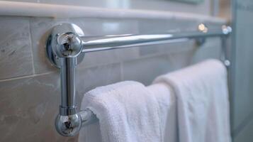 Clean and polished The polished chrome finish on a towel bar has a clean and pristine appearance with no visible imperfections or blemishes photo