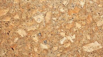 Light tan cork with a speckled effect resembling grains of sand or salt sprinkled across the surface photo
