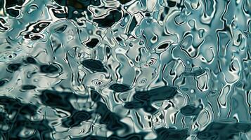 This closeup captures the unique texture of a reflective glass panel with its subtly curved surface resembling rippling water or molten metal. In the reflection the viewer can catc photo