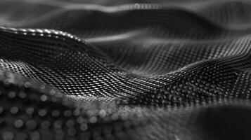 Fine almost imperceptible wrinkles and folds add depth and character to the otherwise flat and uniform surface of the graphene sheet photo