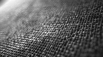 The textured surface of the screen resembles a canvas with a multitude of fine intersecting lines photo