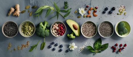 Assortment of Fresh and Dried Healthy Foods on a Gray Surface photo