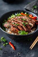 Black Bowl of Rice With Bok Choy, Spicy Sauce, and Sesame Seeds photo