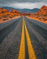 Empty Road Through Valley of Fire State Park During Cloudy Day photo