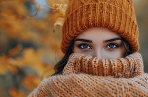 Woman Wearing Knitted Hat and Sweater in Fall photo