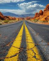 Empty Road Leading Through Red Rock Canyon National Conservation Area photo