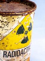 Rusty container of old Radioactive material barrel photo