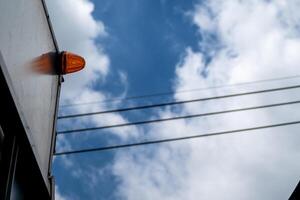 Additional turn signal mounted on the container on the transport vehicle photo