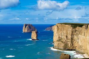 Exploring the Beauty of Majestic Cliffs, Nature's Impressive Coastal Formations photo