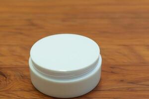 The beautiful photo captures the elegance of good cosmetic packaging for cream containers, highlighting future cosmetic innovations with sleek, modern designs