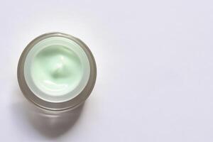 The beautiful mockup showcases good cosmetic packaging for cream containers, emphasizing future cosmetic innovations. photo
