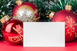 Beautiful Mockup White Card with Christmas Ornaments, A Festive Touch for Your Holiday Greetings photo