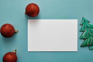 Beautiful Mockup White Card with Christmas Ornaments, A Festive Touch for Your Holiday Greetings photo