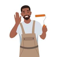 Young bearded man Painter with paintbrush ready to paint the wall. vector