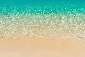 Beautiful Waves and Sands A Mesmerizing Display of Nature's Harmony, Where Crystal Clear Waters Meet Soft Golden Sands, Creating a Serene and Captivating Seascape That Enchants the Soul photo