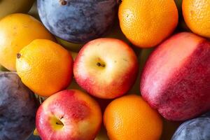Beautiful Tropical Fruits Background A Luscious Display of Nature's Bounty, Featuring an Abundance of Colorful and Exotic Fruits Against a Vibrant and Refreshing Backdrop photo