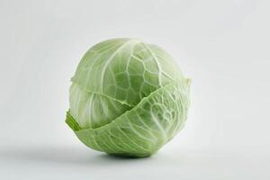 Single ripe cabbage isolated on a white background, perfect for a minimalist design photo